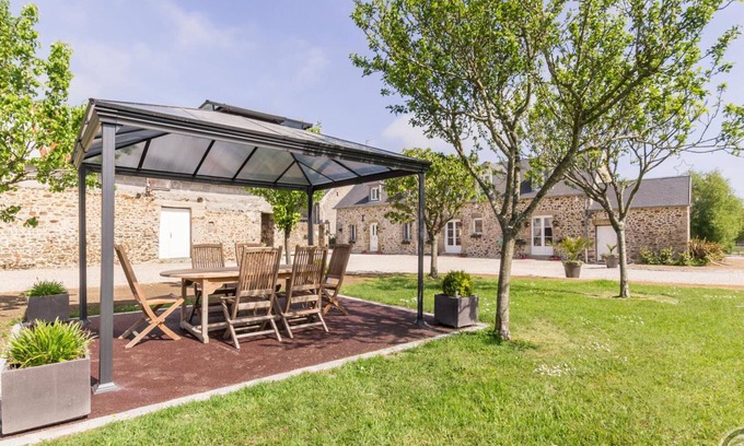 Montsurvent Cottage | Charming Stone Cottage with Private Courtyard, Fishing Pond, and Near the Beach