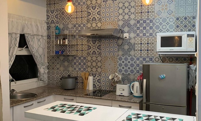 Triolet Apartment | Charming Studio centrally located, 30 meters from the beach with free WIFI