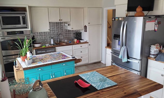 Woodbridge House | Cheerful 4-bedroom home with backyard and pet friendly.