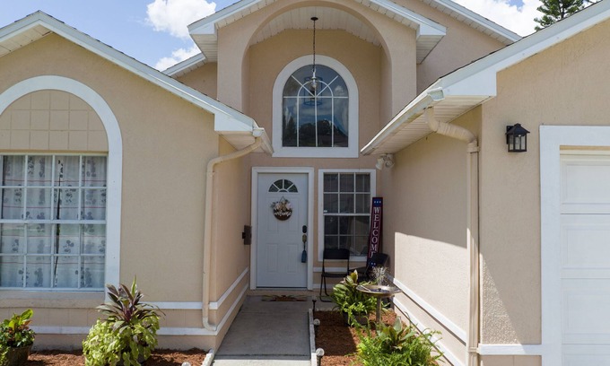 Kissimmee House | Cheerful three bedroom home with Heated Pool in Kissimmee, Florida