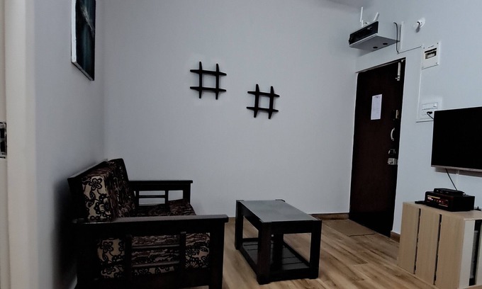 Embassy Golf Links Business Park Apartment | Chez Oly fully furnished set in a quiet, green neighborhood & centrally located!