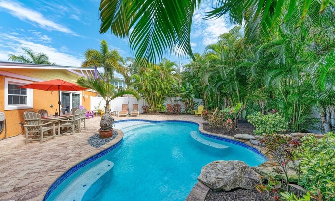 Holmes Beach House | Chiki Tiki West: Eclectic Beach House, Tiki Bar & Pool, 2.5 Blocks to Beach by Anna Maria Life