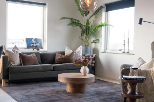 Bastad House | Chocolaty Warmth Home 3BR Flat with Cozy Balcony