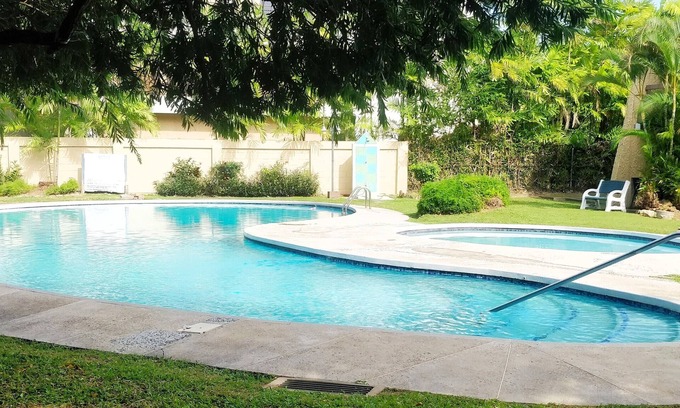 Diego Martin Condo | City Charm & Poolside Peace -Gated