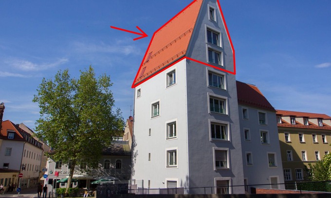 City Centre Regensburg Apartment | City tower above the rooftops of Regensburg