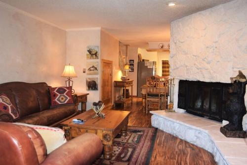 Red River House | Claim Jumper Townhouse 16 - On The River - Across from the Fishing Ponds - In Town - Near The Ski Area - Fireplace - WiFi - Sate