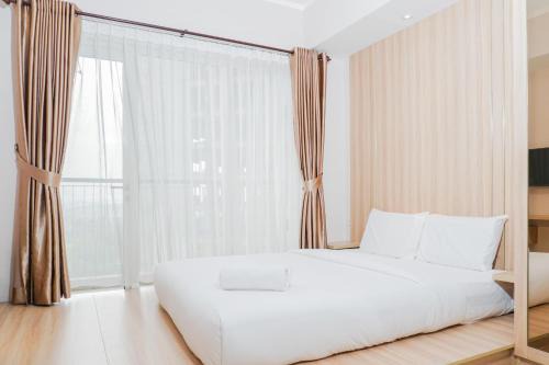 Cikarang Apartment | Clean and Elegant 1BR at The Oasis Apartment By Travelio