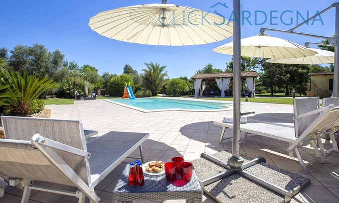 Alghero Villa | ClickSardegna Villa Paradiso with swimming pool and exclusive tennis court