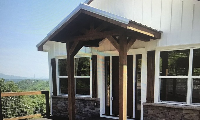 Chalet Village Cabin | Cliff's Edge: A luxury cabin with Smoky Mountain views