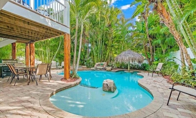 Holmes Beach House | Coastal Bliss- 2-Minute Walk (500 Feet) to the beach with private pool and spa