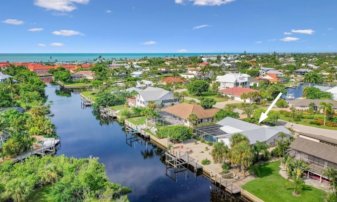 Shell Harbor House | Coastal Charm: Pool Home on Canal on East End!