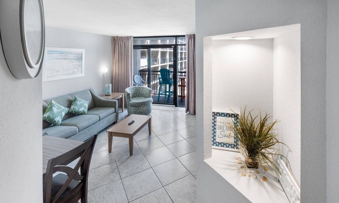 Windy Hill Condo | Coastal condo w/balcony & hot tubs