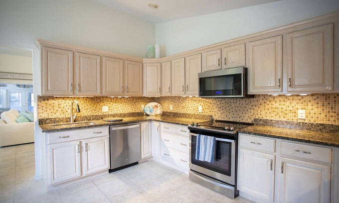 Naples Park House | Coastal Gem - 1 Mile to the Beach - Newly Updated 3 bedroom plus Den