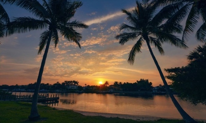 Juno Beach House | Coastal house in Juno beach with heated saltwater pool. Walk to the local beach.