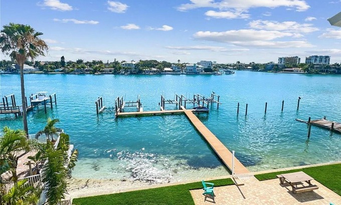 Treasure Island Condo | Coastal living with water views, sunrises, sunsets and boat slip