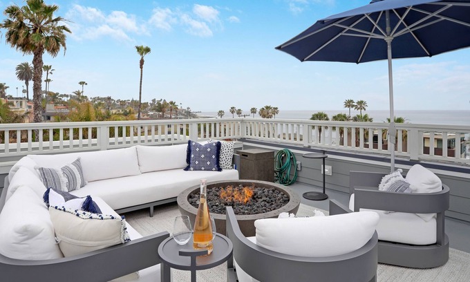 Beach Barber Tract House | Coastal retreat near the beach w/panoramic ocean views, rooftop deck, & firepit