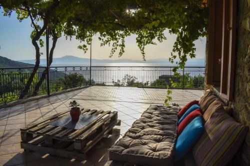 Kitries House | Coastal Stone Residence with Spectacular Scenery
