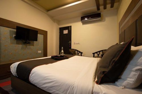 Aluva Hotel | Collection O Aluva Kinfra Hi-Tech Park