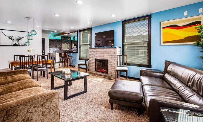 Brighton House | Colorfully renovated home with WiFi, fireplace, deck, patio, grill, & firepit