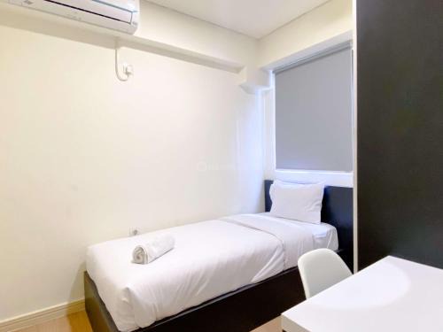 Cikarang Apartment | Comfort 2BR with Work Space at Meikarta Apartment By Travelio