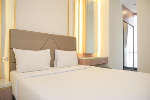 Bendungan Hilir Apartment | Comfort and Elegant 2BR Sudirman Suites Apartment By Travelio