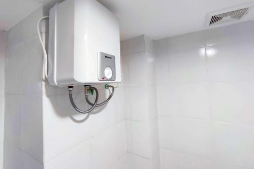 Jatingaleh Apartment | Comfort and Well Design Studio at Paltrow City Apartment By Travelio