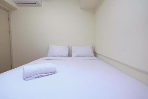 Cikarang Apartment | Comfortable 2BR with Workspace at Meikarta Apartment By Travelio