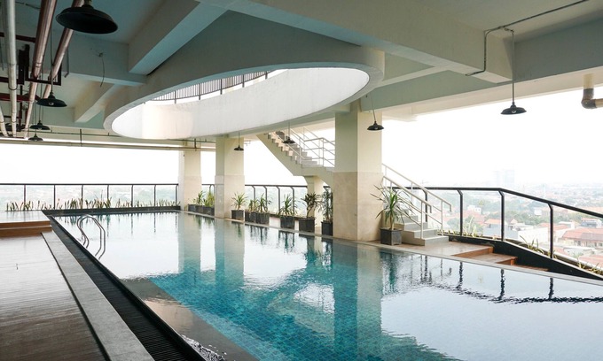 Pondokcina Apartment | Comfortable and Beautiful 1BR Apartment at Atlanta Residence
