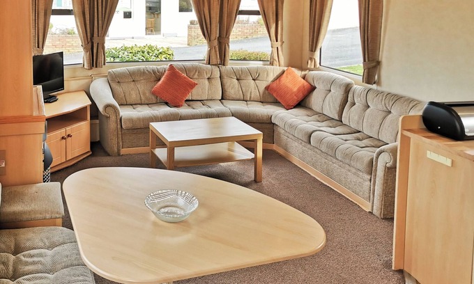 Ludchurch House | Comfortable and spacious 12ft-wide caravan with one double and two twin.