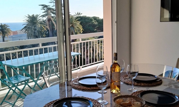 Fabron Apartment | Comfortable apartment with sea view in gated residence with private parking.