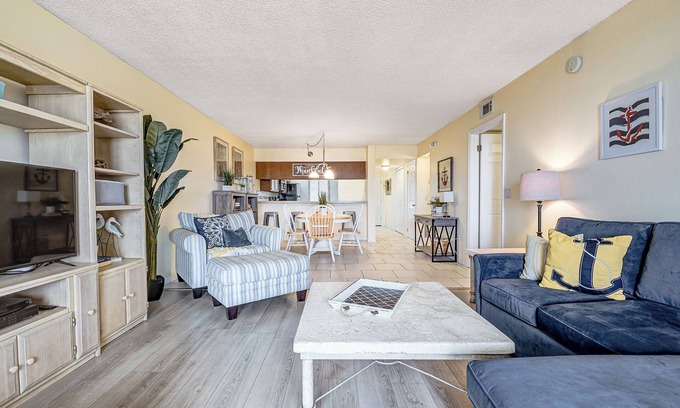 Cocoa Beach Condo | Comfortable, Coastal, Beachy Condo with Balcony, Pool, Tennis Court & Family Fun!