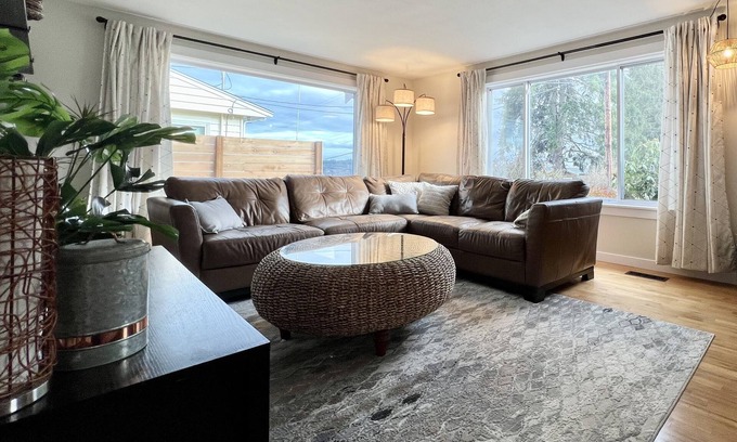 Silverdale House | Comfortable family retreat with fireplace, views and game room.