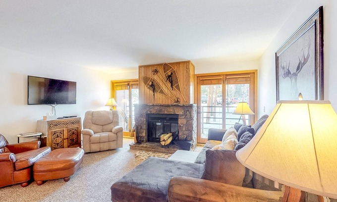 Wildernest Condo | Comfortable mountain condo with wood-burning fireplace & patio, near skiing