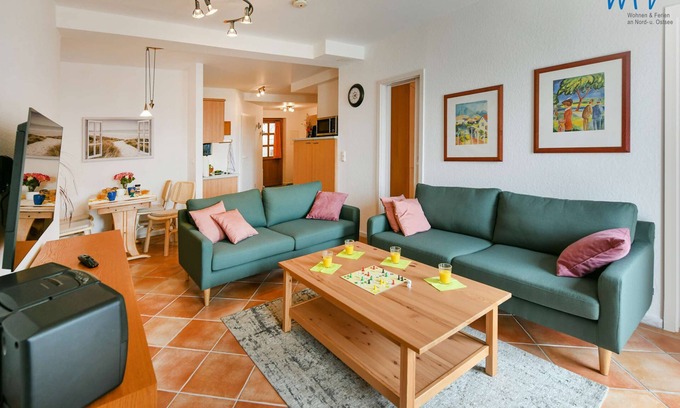 Neuensien Apartment | Comfortable vacation apartment with lake view and conservatory in the Seedorf vacation park