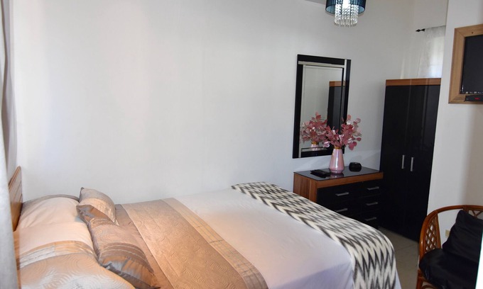 Mammee Bay Estates Apartment | Comfy bedrooms with swimming pool plus free wifi, spa hut, bbq, 24-hour security
