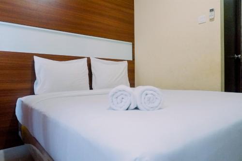 Surabaya Apartment | Compact Studio Room at Tamansari Papilio Apartment By Travelio