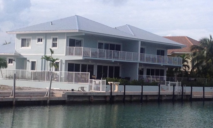 Key Colony Beach House | Compelling Canal Home with Pool & Large Dock on each side-Cabana Club Included