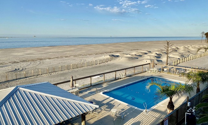 Dauphin Island Condo | Completely Renovated Modern Condo On the Water Sandcastle 6A