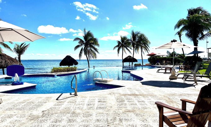 Puerto Morelos Condo | Condo #322 at Caribbean Reef Villas - OceanFront, huge pool for families/couples