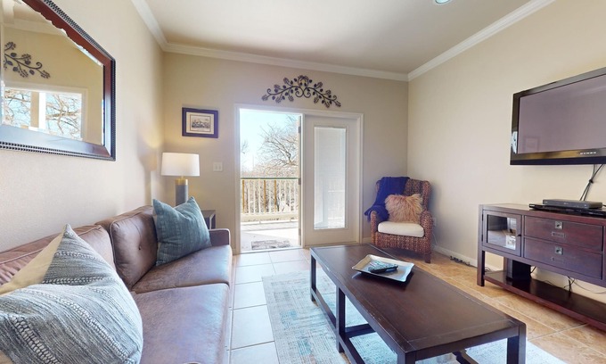 Gruene Condo | Condo in Gruene overlooking the Guadalupe! VG103 : Free Tubes with Rental!