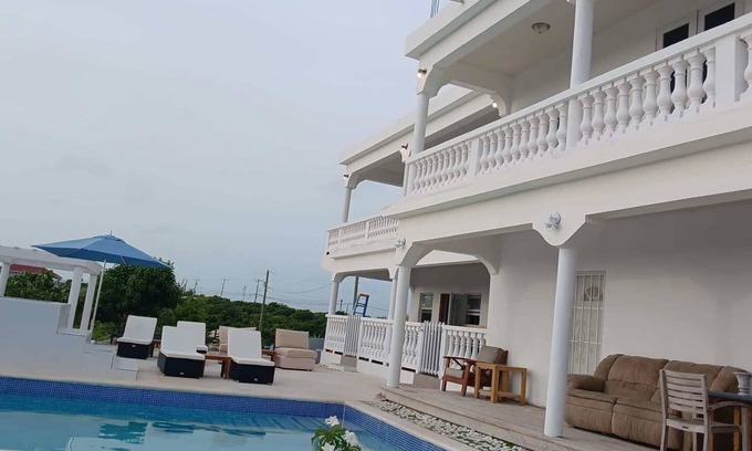Wheeland Settlement Apartment | Condo with sea view (unit 2)