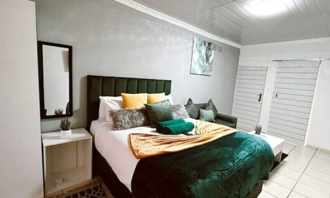 Newcastle House | Contemporary Gem: Studio with Serene Pool Viewn