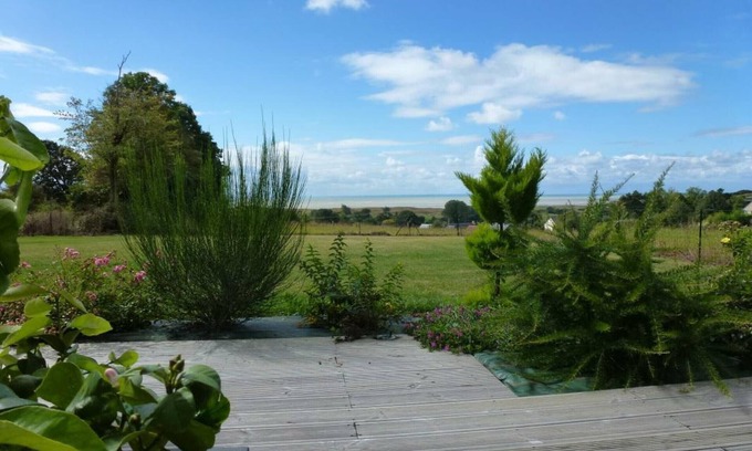 Dragey-Ronthon Cottage | Contemporary house with enclosed garden, terrace and bay views