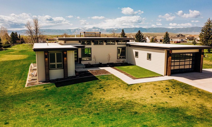 Sheridan House | Contemporary Wyoming Luxury- Midcentury Modern, mountain views & rooftop deck