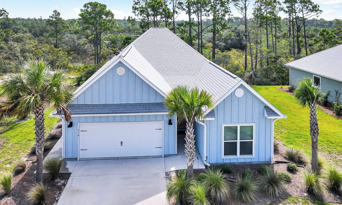 Port St. Joe House | "CORAL SUNSETS" IS A 4BD W/MOTHER-IN-LAW SUITE! OPTION TO RENT GOLF CART, PET FRIENDLY!