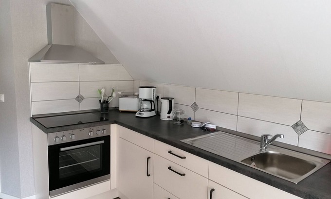 Dornum Apartment | Core-serviced apartment directly on the small dike for up to 3 people