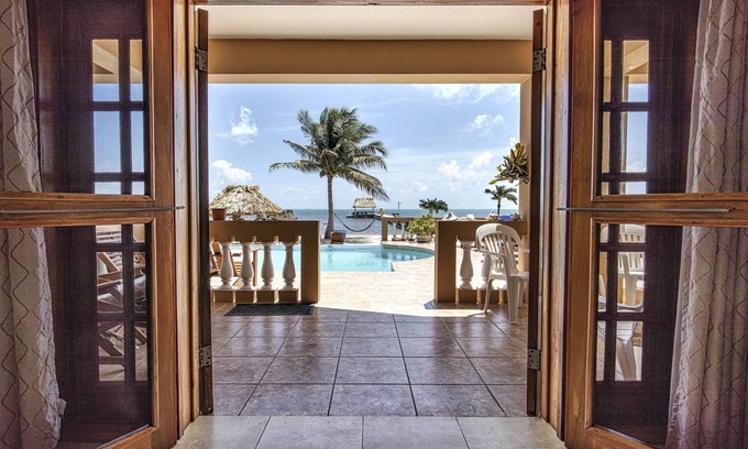 Boca Ciega Condo | Corner unit- Walk out door to 3 pools & beach! Oceanfront with panoramic views