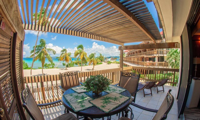 Red Hook Condo | Corner unit with unobstructed views of Sapphire Beach which is steps away.