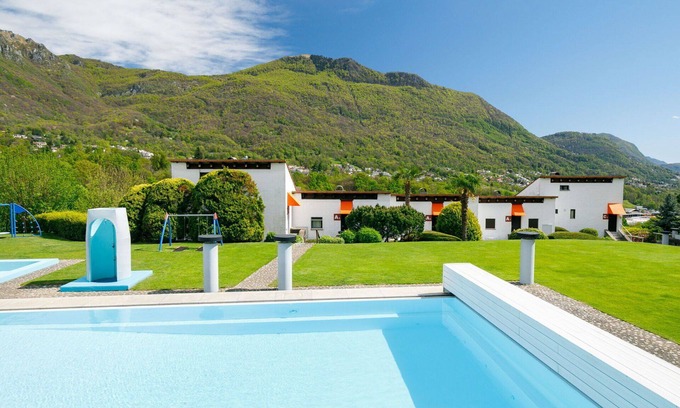 Capriasca Apartment | Cosy apartment for 5 guests with pool, WIFI, TV, patio, pets allowed, panoramic view and parking