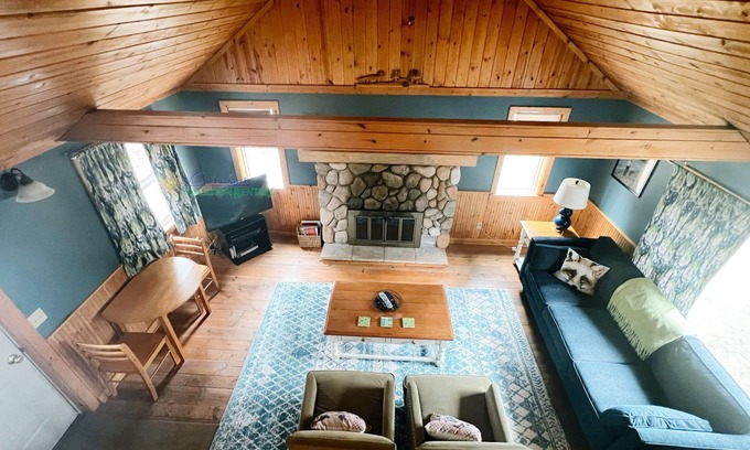 Glen Arbor House | Cottage in Glen Arbor with Crystal River frontage, Canoe, FP, A/C, Dogs ok